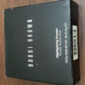 Bobbi Brown highlighting powder in pink glow.